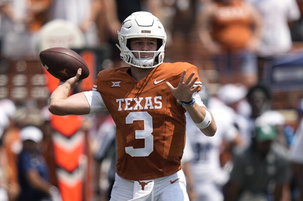 Texas quarterback Quinn Ewers (3) throws against Rice during the first half of an NCAA college football game in Austin, Texas, Saturday, Sept. 2, 2023. (AP Photo/Eric Gay)