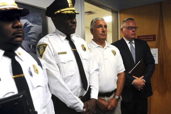 
              Jim Carroll, far right, acting deputy director of the White House Office of National Drug Control Policy stands with, from left, New Haven Fire Chief John Alston, New Haven Police Chief Anthony Campbell and New Haven Director of Emergency Operation Rick Fontana during a press conference following a meeting with state and city officials at the Connecticut Mental Health Center, in New Haven, Conn. Aug. 20, 2018. Carroll visited New Haven on Monday after more than 100 recent overdoses on synthetic marijuana at a city park. (Ned Gerard/Hearst Connecticut Media via AP)
            