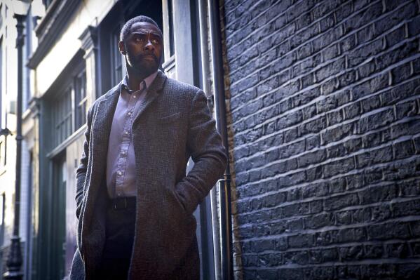 This image released by Netflix shows Idris Elba in a scene from "Luther: The Fallen Sun." (John Wilson/Netflix via AP)