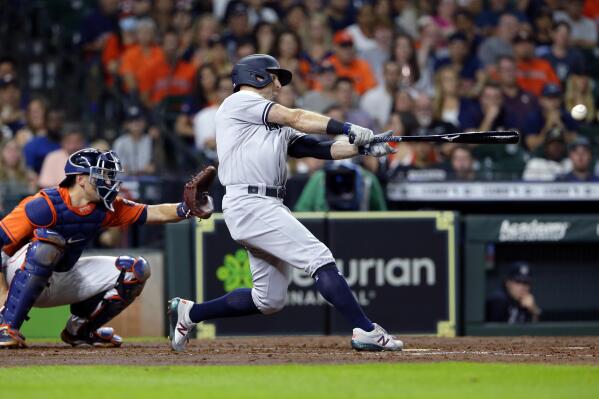 Injured Astros catcher Jason Castro takes batting practice