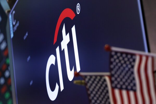 FILE - In this Feb. 8, 2019, file photo the logo for Citigroup appears above a trading post on the floor of the New York Stock Exchange.  Citigroup Inc. reports financial results Wednesday, April 15, 2020. . (AP Photo/Richard Drew, File)