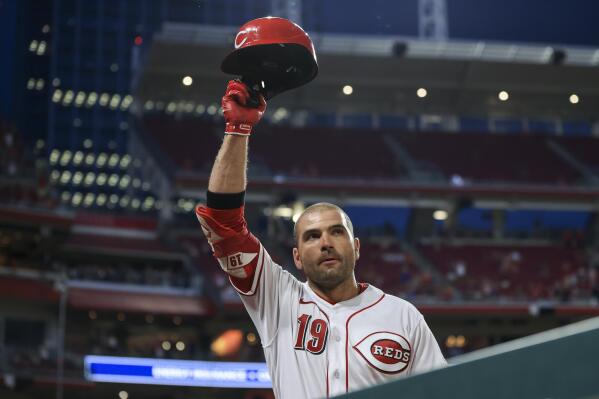 Cincinnati Reds' Tyler Naquin celebrates a 5-4 win against the