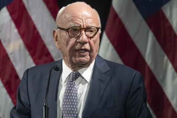 FILE - Rupert Murdoch introduces Secretary of State Mike Pompeo during the Herman Kahn Award Gala on Oct. 30, 2019, in New York. The judge presiding over a voting machine company’s defamation lawsuit against Fox denied the company’s request Wednesday, April 12, 2023, to hold separate trials — one for Fox News and another for the network’s parent company. The request by Dominion Voting Systems came a day after its attorneys told the judge that Fox attorneys had withheld critical information about the role that company founder Rupert Murdoch, who is chairman of Fox. Corp., played at Fox News. (AP Photo/Mary Altaffer, File)