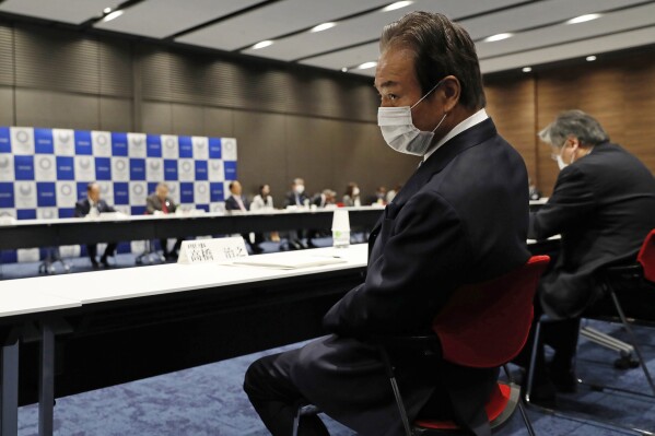 FILE - Haruyuki Takahashi, executive board member of the Tokyo Organizing Committee of the Olympic and Paralympic Games attends the Tokyo 2020 Executive Board Meeting in Tokyo, Japan, on March 30, 2020. Takahashi, a former Tokyo Olympic organizing committee member, appeared in a court on Wednesday, Jan. 31, 2024, and asserted he was innocent of taking bribes connected to the Tokyo Games. (Issei Kato/Pool Photo via AP, File)