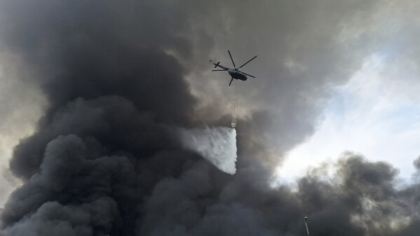 Iran’s president visits the ones injured within the port explosion that killed a minimum of 40 other people