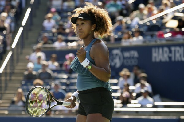 Japan's Naomi Osaka celebrates a point during her win over Tunisia's Ons Jabeur at the National Bank Open in Toronto on Wednesday, August 7, 2024. (Chris Young/The Canadian Press via AP)