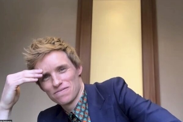 In this image from video, Eddie Redmayne appears on screen immediately following the announcement of his Screen Actors Guild Award win for outstanding performance by a cast in a motion picture for "The Trial of The Chicago 7" on Thursday, April 1, 2021. The 27th annual SAG Awards airs Sunday, April 4. (AP Photo)