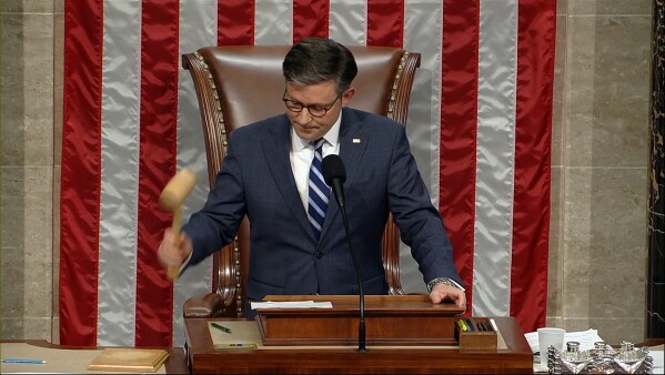 This image from House Television shows House Speaker Mike Johnson of La., banging the gavel after he announced the House voted to impeach Homeland Security Secretary Alejandro Mayorkas over the Biden administration's handling of the U.S-Mexico border, at the U.S. Capitol Tuesday, Feb. 13, 2024, in Washington. (House Television via AP)