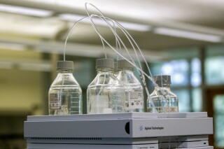 FILE - Equipment used to test for perfluoroalkyl and polyfluoroalkyl substances, known collectively as PFAS, in drinking water is seen at Trident Laboratories in Holland, Mich., June 18, 2018. Drinking water from nearly half of U.S. faucets likely contains “forever chemicals” linked to kidney cancer and other health problems, according to a government study released Wednesday, July 5, 2023. (Cory Morse/The Grand Rapids Press via AP, File)