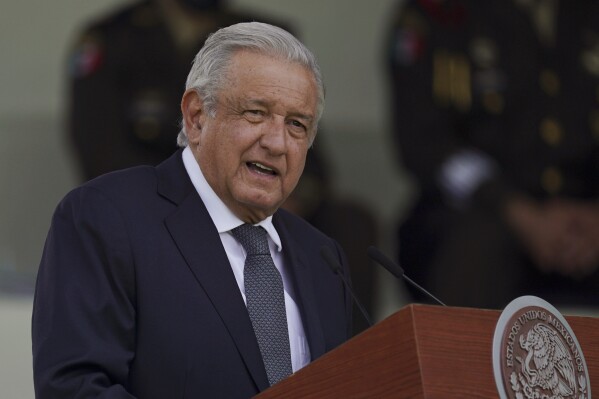 FILE - Mexican President Andres Manuel Lopez Obrador speaks during a military parade in Mexico City, Aug. 13, 2021. Mexico鈥檚 president acknowledged Tuesday, Feb. 20, 2024 that the armed forces will take over fixing the nation鈥檚 highways. (APPhoto/Fernando Llano, File)