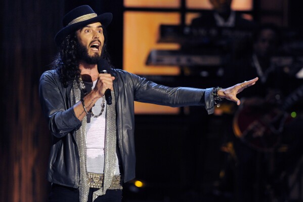 FILE - In this Nov. 3, 2012 file photo, comedian Russell Brand performs at 