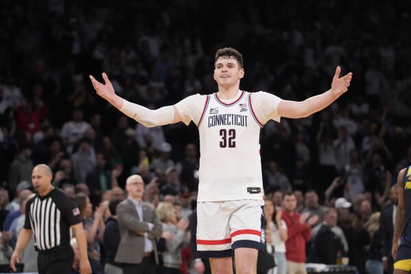 UConn center Donovan Clingan reacts during the second half of the team's NCAA college basketball game for the championship of the Big East men's tournament Saturday, March 16, 2024, in New York. (AP Photo/Mary Altaffer)