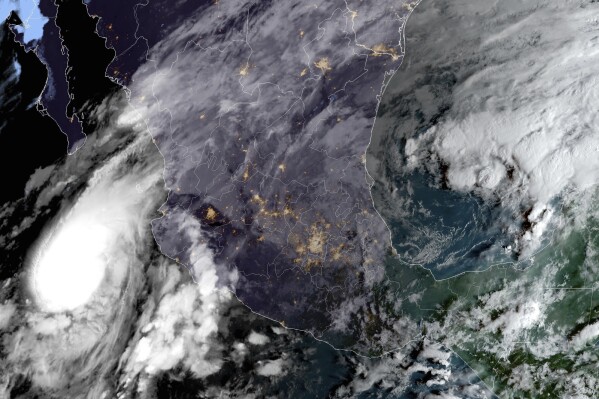 This satellite image provided by NOAA at 8am E.T. on Tuesday, Oct. 10, 2023 shows Hurricane Lidia in the Pacific Ocean approaching Puerto Vallarta, Mexico. (NOAA via AP)