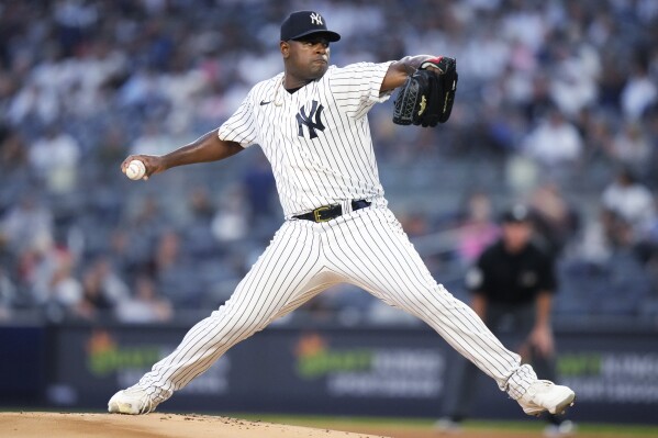 FILE - New York Yankees' Luis Severino pitches during the first inning of the team's baseball game against the Houston Astros on Aug. 4, 2023, in New York. Severino worried about whether he was tipping batters to his fastball and changeup last season, a flaw the 29-year-old right-hander hopes to correct before he reports to the New York Mets for spring training. “There’s a lot of things that I think I was doing wrong. I always have problems with ... tipping and stuff like that,” Severino said Wednesday, Jan. 10, during a news conference the Mets held on Zoom to discuss his $13 million, one-year contract. (AP Photo/Frank Franklin II, File)