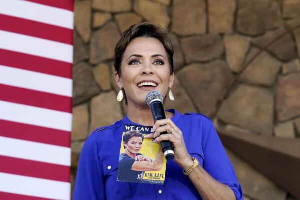 FILE - Republican gubernatorial candidate Kari Lake speaks to supporters at a campaign event in Queen Creek, Ariz., Oct. 5, 2022. Lake lost the race for Arizona governor last year but she built a loyal following that stretches far beyond the state. Her meteoric rise is virtually unheard of for a first-time candidate who started her campaign with no national profile. (AP Photo/Ross D. Franklin, File)