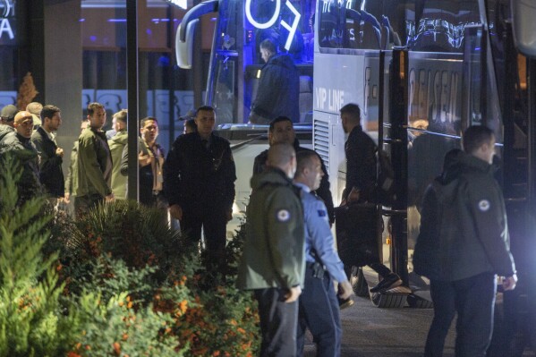 Israel's national soccer team arrive at a hotel, in the capital Pristina, Friday, Nov. 10, 2023. Israel’s national soccer team has arrived in Kosovo amid tight security measures at the airport ahead of a postponed European Championship qualifier. (AP Photo/Visar Kryeziu)