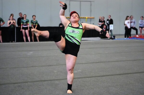 Raiden Hung of Jurassic Gymnastics from Boston, competes in the floor exercise at the 2025 NAIGC national competition in Pittsburgh, Friday, April 4, 2025. (AP Photo/Gene J. Puskar)