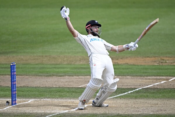 New Zealand's Kane Williamson avoids a delivery while batting against South Africa on the fourth day of their cricket test in Hamilton, New Zealand. Friday, Feb. 16, 2024. (Andrew Cornaga/Photosport via AP)