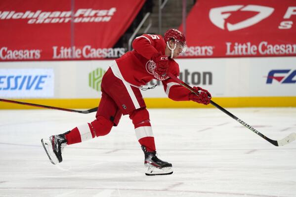 Detroit Red Wings forward Jakub Vrana shoots the puck for a goal during the second period of an NHL hockey game against the Chicago Blackhawks, Thursday, April 15, 2021, in Detroit. (AP Photo/Carlos Osorio)