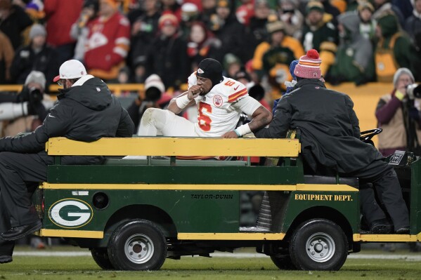 Kansas City Chiefs safety Bryan Cook (6) is carted off the field after being injured against the Green Bay Packers during the second half of an NFL football game Sunday, Dec. 3, 2023 in Green Bay, Wis. (APPhoto/Morry Gash)