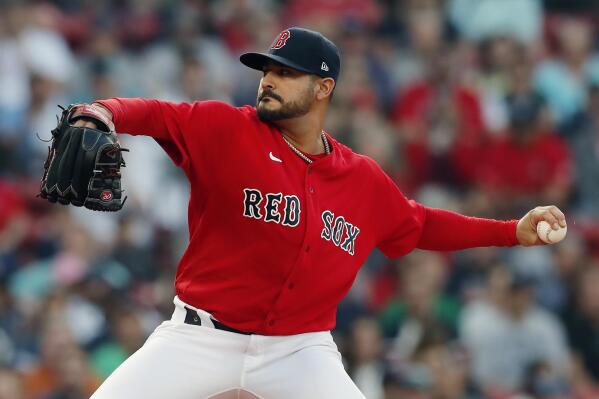 Boston Red Sox's Hirokazu Sawamura throws a pitch during the fifth