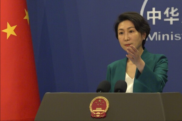CORRECTS THE PHOTOGRAPHER'S NAME - In this image taken from video, China's Foreign Ministry spokesperson Mao Ning speaks during a regular briefing held in Beijing, Friday, May 23, 2025. (AP Photo/Liu Zheng)
