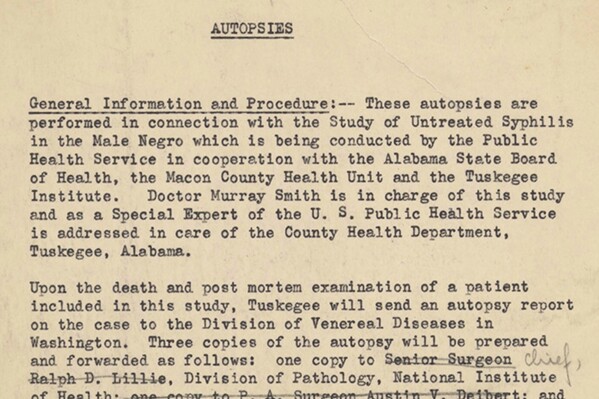 This image made available by the U.S. National Archives shows part of a 1940-dated document describing procedures for the distribution of autopsy results from subjects of the Tuskegee Syphilis Study conducted by the U.S. government. For 40 years starting in 1932, medical workers in the segregated South withheld treatment for Black men who were unaware they had syphilis, so doctors could track the ravages of the illness and dissect their bodies afterward. (National Archives via ĢӰԺ)