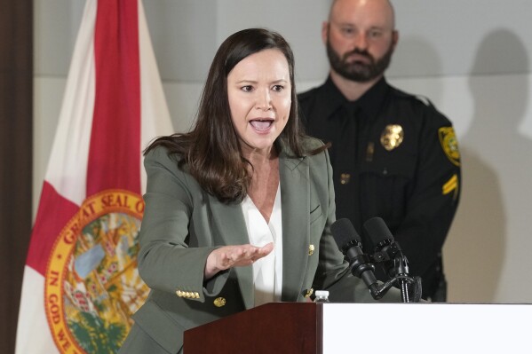 FILE - Florida Attorney General Ashley Moody speaks at a news conference, Jan. 26, 2023, in Miami. A petition initiative that would enshrine abortion rights in the Florida constitution on Friday, Jan. 5, 2024, reached the necessary number of verified signatures to qualify for the 2024 ballot. (AP Photo/Marta Lavandier, File)