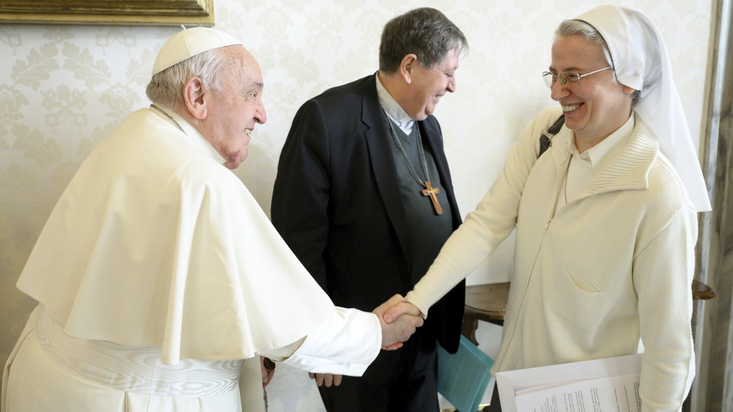 Pope names first woman to head major Vatican office…