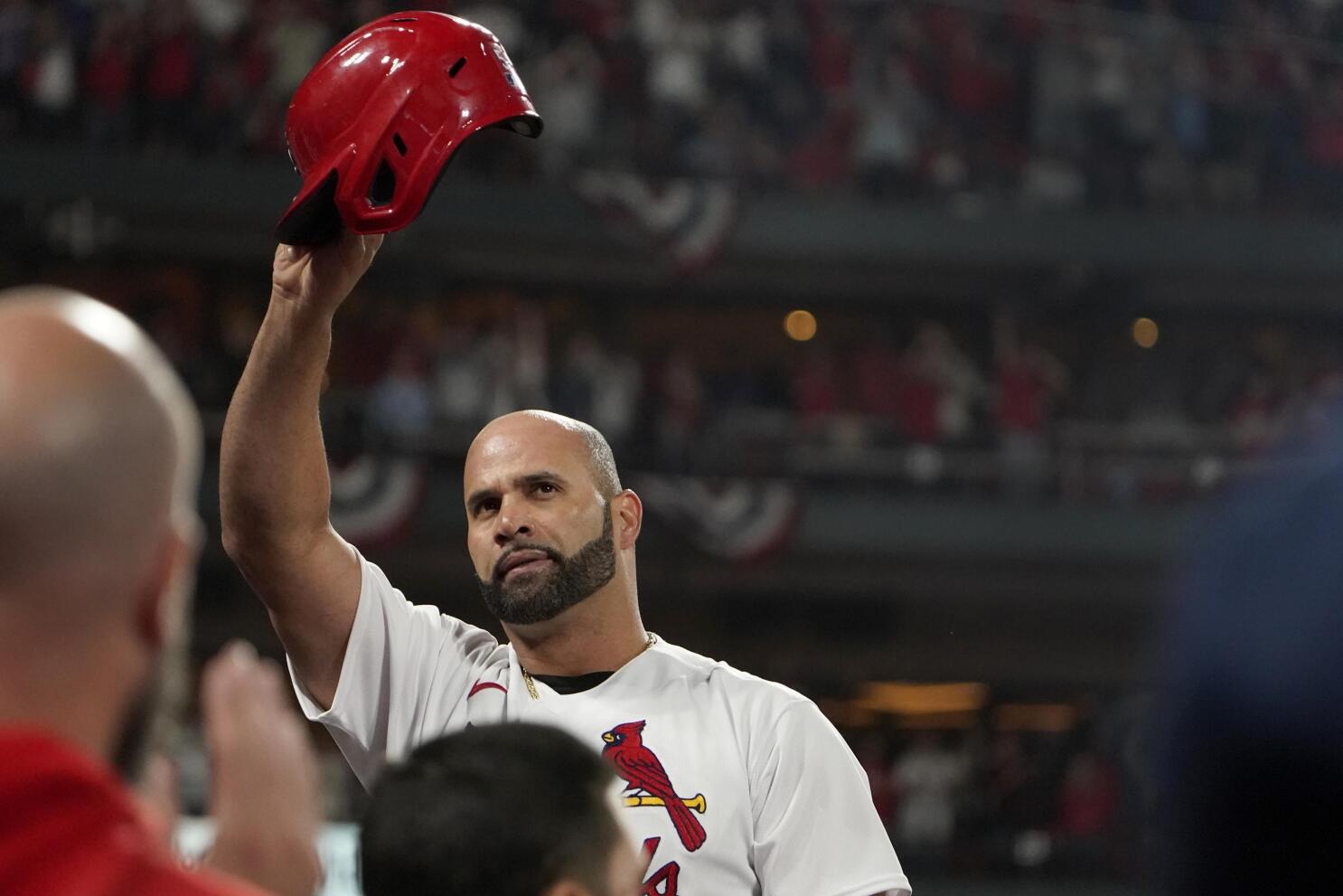 To celebrate reaching 3,000 hits, Albert Pujols threw out a first