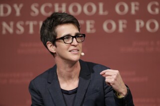 FILE - MSNBC television anchor Rachel Maddow, host of the Rachel Maddow Show, moderates a panel, Monday, Oct. 16, 2017, at a forum called "Perspectives on National Security," at the John F. Kennedy School of Government, on the campus of Harvard University, in Cambridge, Mass. Maddow’s next book will be an exploration into right-wing extremism in the U.S., including a plot to overthrow the government at the start of World War II. Crown, an imprint of Penguin Random House, announced Monday, July 31, 2023, that Maddow’s “Prequel: An American Fight Against Fascism” will be published Oct. 17. (AP Photo/Steven Senne, File)