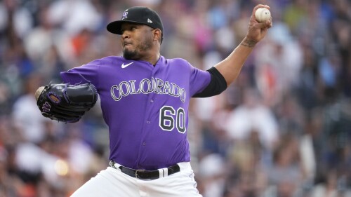 Colorado Rockies relief pitcher Fernando Abad works against the Houston Astros during the fourth inning of a baseball game Tuesday, July 18, 2023, in Denver. (AP Photo/David Zalubowski)