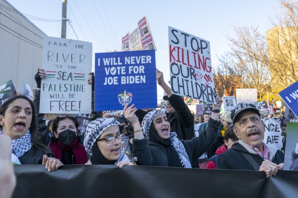 Around a thousand Palestinian and pro-Palestinian demonstrators rally at the corner of W. Hubbard St. and N. Armour St. near where President Joe Biden was attending a fundraising event in the West Town neighborhood of Chicago, Thursday, Nov. 9, 2023. Demonstrators were demanding that the President as well as national Democrats use their power to broker a ceasefire between Israel and Hamas whose conflict has killed thousands of civilians most of whom are Palestinian. (Tyler Pasciak LaRiviere/Chicago Sun-Times via AP)