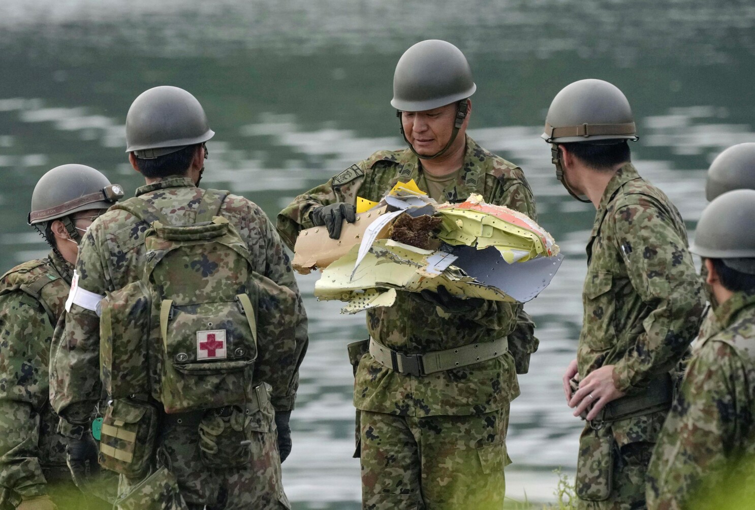 Japan starts emergency inspections on nearly 200 military training planes after crash