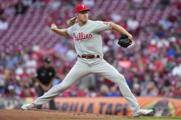 Philadelphia Phillies starting pitcher Noah Syndergaard throws during the third inning of the team's baseball game against the Cincinnati Reds on Monday, Aug. 15, 2022, in Cincinnati. (AP Photo/Jeff Dean)