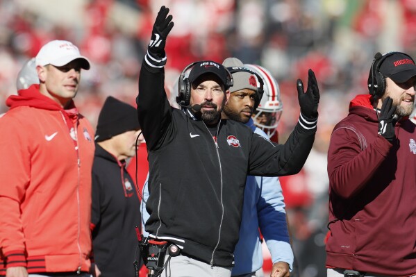 Ohio State head coach Ryan Day reacts to a replay during the first half of an NCAA college football game against Michigan Saturday, Nov. 30, 2024, in Columbus, Ohio. (AP Photo/Jay LaPrete, File)