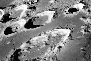 
              FILE - This Dec. 29, 1968 photo made available by NASA shows the large moon crater Goclenius, foreground, approximately 40 statute miles in diameter, and three clustered craters Magelhaens, Magelhaens A, and Colombo A, during the Apollo 8 mission. For the past 290 million years, giant rocks from space have been crashing into Earth more than twice as often as they did in the previous 700 million years, according to a new study published in the Thursday, Jan. 17, 2019 edition of the journal Science. (NASA via AP, File)
            