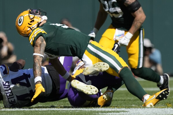 Packers wide receiver Christian Watson leaves game against Vikings with  ankle injury | AP News