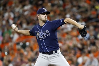 FILE - Tampa Bay Rays starting pitcher Jake Odorizzi throws to the Baltimore Orioles during a baseball game in Baltimore, Saturday, Sept. 23, 2017. Odorizzi is rejoining the Tampa Bay Rays on a minor league contract with an invitation to major league spring training. The team announced the signing Friday, March 15, 2024.(AP Photo/Patrick Semansky, File)