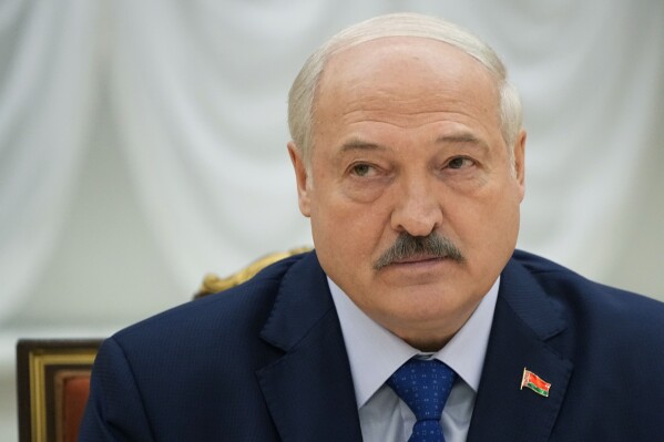 FILE - Belarusian President Alexander Lukashenko listens, during his meeting with foreign correspondents, in Minsk, Belarus, on July 6, 2023. Belarusian authorities on Monday Jan. 8, 2024 said they will not invite observers from the Organization for Security and Cooperation in Europe to monitor the country's parliamentary and local elections, scheduled for Feb. 25. The move is the latest authoritarian President Alexander Lukashenko has undertaken in recent years to further cement his control over the country's political institutions. (AP Photo/Alexander Zemlianichenko, File)