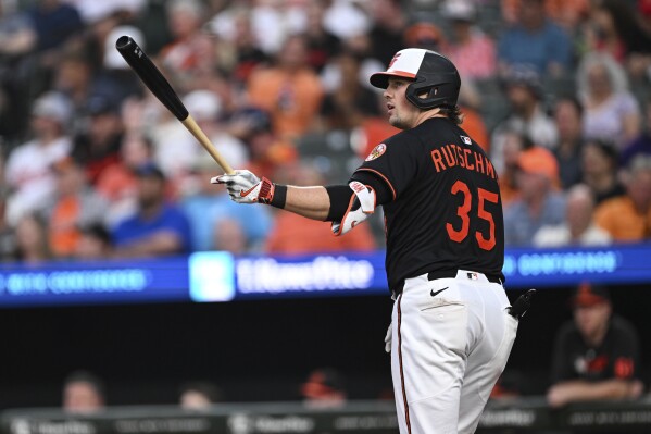 Baltimore Orioles' Adley Rutschman (35) looks on after striking out against Detroit Tigers pitcher Tarik Skubal during the sixth inning of a baseball game in Baltimore, Thursday, June 12, 2025. (AP Photo/Terrance Williams)
