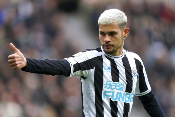 Newcastle United's Bruno Guimaraes during the English Premier League soccer match between Wolverhampton Wanderers and Newcastle United at St. James' Park, Newcastle, England, Sunday March 12, 2023. (Owen Humphreys/PA via AP)