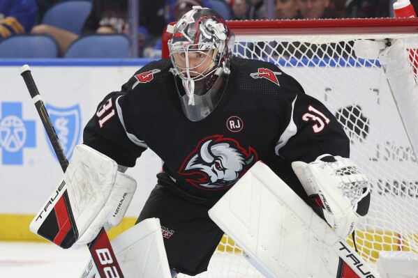 Rested Hurricanes storm Devils, force goalie swap in second-round