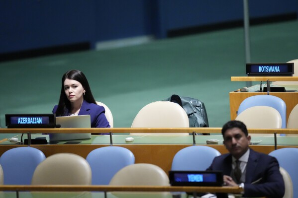 A member of Azerbaijan's delegation listens as Armenia's Foreign Minister Ararat Mirzoyan addresses the 78th session of the United Nations General Assembly, Saturday, Sept. 23, 2023, at United Nations headquarters. (AP Photo/Mary Altaffer)