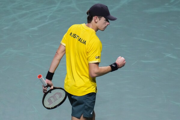 Australia's Alex De Minaur celebrates during a Davis Cup quarter-final tennis match against Jiri Lehecka of the Czech Republic in Malaga, Spain, Wednesday, Nov. 22, 2023. (AP Photo/Manu Fernandez)