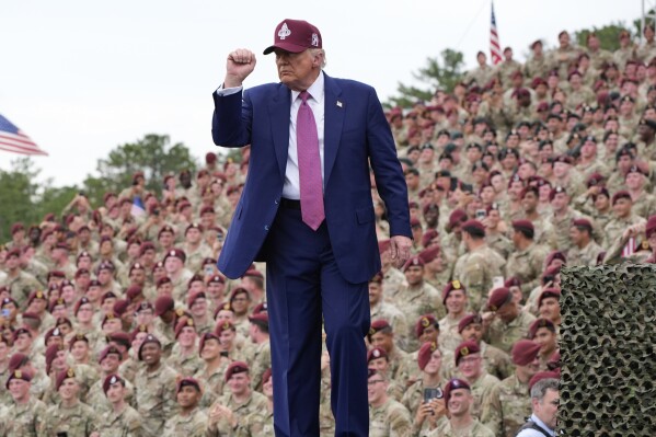 President Donald Trump gestures after speaking at Fort Bragg, Tuesday, June 10, 2025, in Fort Bragg, N.C. (AP Photo/Alex Brandon)