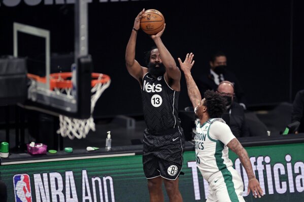 Brooklyn Nets guard James Harden (13) shoots over Boston Celtics guard Marcus Smart during the first half of an NBA basketball game, Thursday, March 11, 2021, in New York. (AP Photo/Adam Hunger)