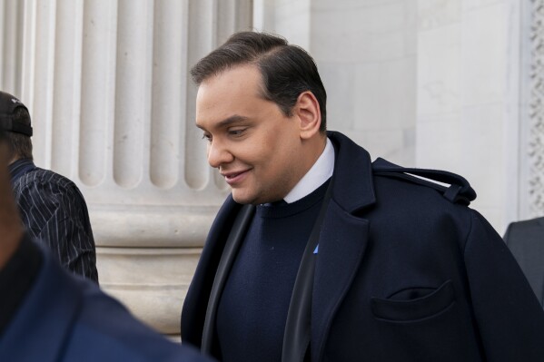 Rep. George Santos, R-N.Y., leaves the Capitol after being expelled from the House of Representatives, Friday, Dec. 1, 2023, in Washington. The House has voted to expel Santos following a critical ethics report on his conduct that included converting campaign donations for his own use, making him just the sixth member in the chamber’s history to be ousted by his colleagues. Expulsion requires support from two-third of the House. (AP Photo/Stephanie Scarbrough)