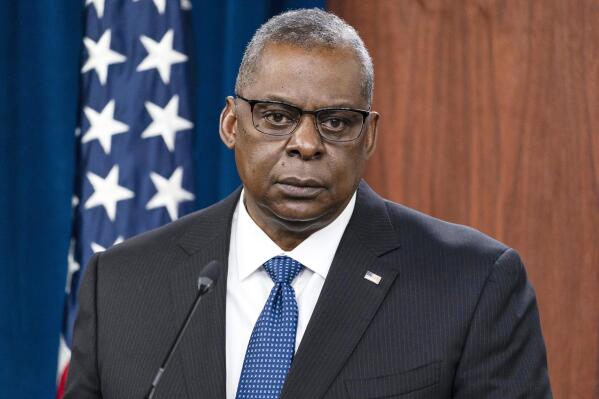 FILE - Secretary of Defense Lloyd Austin speaks during a media briefing at the Pentagon, Friday, Jan. 28, 2022, in Washington. Six Black members of President Joe Biden's Cabinet will be meeting for a Black History Month event Thursday highlighting their roles in the administration, some of which are historic firsts. (AP Photo/Alex Brandon, File)