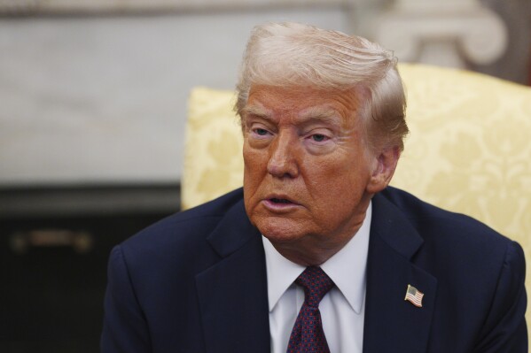 President Donald Trump talks during a meeting with British Prime Minister Keir Starmer, at the White House, Thursday, Feb. 27, 2025, in Washington. (Carl Court/Pool via AP)